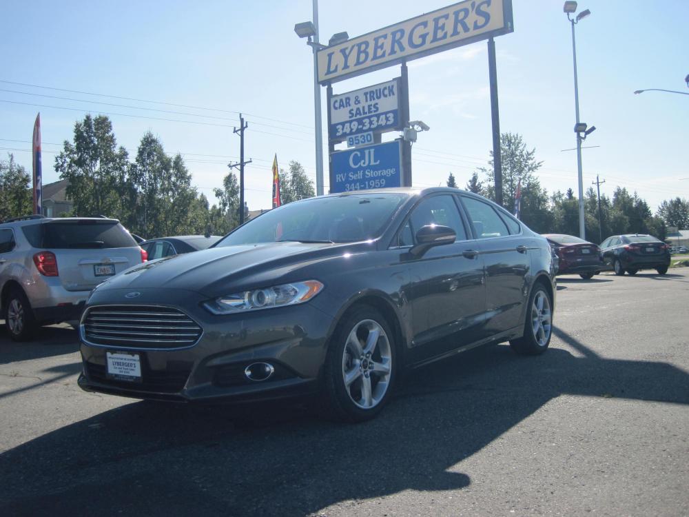 2016 gray /black Ford Fusion (3FA6P0H93GR) with an 2.0L L4 DOHC 16V engine, 6-Speed Automatic transmission, located at 9530 Old Seward Highway, Anchorage, AK, 99515, (907) 349-3343, 61.134140, -149.865570 - Photo #0
