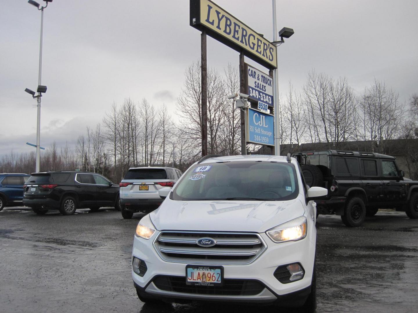 2018 white /gray Ford Escape SE 4WD (1FMCU9GD9JU) with an 1.5L L4 DOHC 16V engine, 6A transmission, located at 9530 Old Seward Highway, Anchorage, AK, 99515, (907) 349-3343, 61.134140, -149.865570 - Photo#1