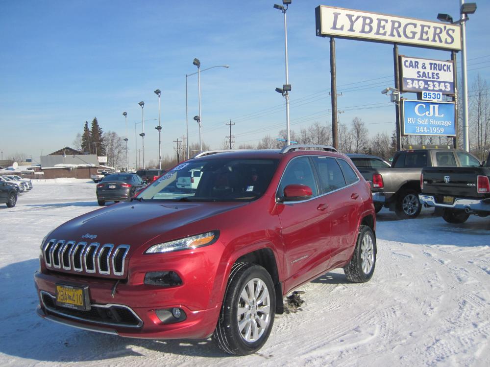 2016 maroon /black Jeep Cherokee Overland 4WD (1C4PJMJS1GW) with an 3.2L V6 DOHC 24V engine, 9A transmission, located at 9530 Old Seward Highway, Anchorage, AK, 99515, (907) 349-3343, 61.134140, -149.865570 - Photo #0