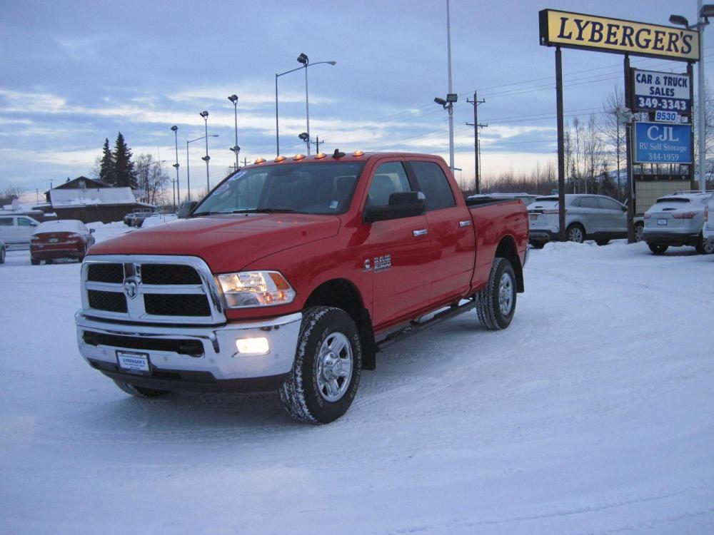 2018 red /gray RAM 2500 SLT Crew Cab SWB 4WD (3C6UR5DL7JG) with an 6.7L L6 OHV 24V TURBO DIESEL engine, 6A transmission, located at 9530 Old Seward Highway, Anchorage, AK, 99515, (907) 349-3343, 61.134140, -149.865570 - Low miles on this Ram 2500 SLT Diesel, Sunnroof, Heated mirrors - Photo #0