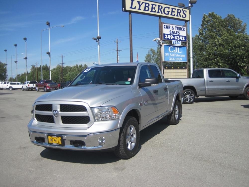 2014 silver /gray RAM 1500 SLT Quad Cab 4WD (1C6RR7GT9ES) with an 5.7L V8 OHV 16V engine, 6-Speed Automatic transmission, located at 9530 Old Seward Highway, Anchorage, AK, 99515, (907) 349-3343, 61.134140, -149.865570 - Photo #0