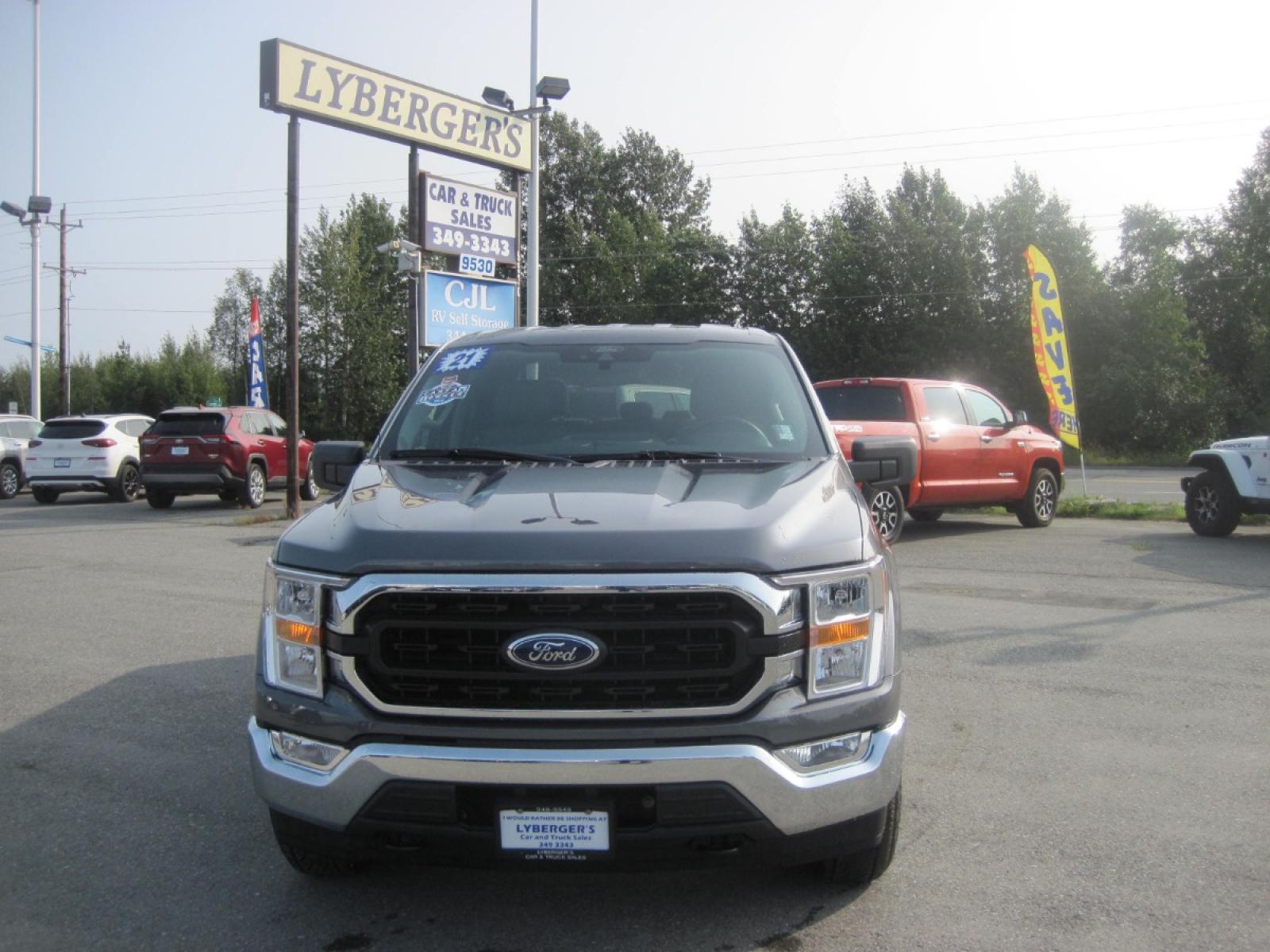 2021 gray /black Ford F-150 XLT SuperCrew 5.5-ft. Bed 4WD (1FTEW1EB2MF) with an 3.3L V6 DOHC 24V engine, 6A transmission, located at 9530 Old Seward Highway, Anchorage, AK, 99515, (907) 349-3343, 61.134140, -149.865570 - Low Miles on this Ford F150 XLT and Priced te sell - Photo #1
