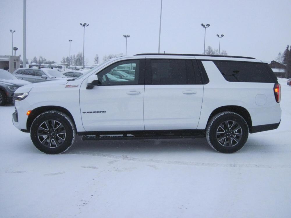 2021 white Chevrolet Suburban Z71 (1GNSKDKD1MR) with an 5.3L V8 OHV 16V engine, 10A transmission, located at 9530 Old Seward Highway, Anchorage, AK, 99515, (907) 349-3343, 61.134140, -149.865570 - Photo #2