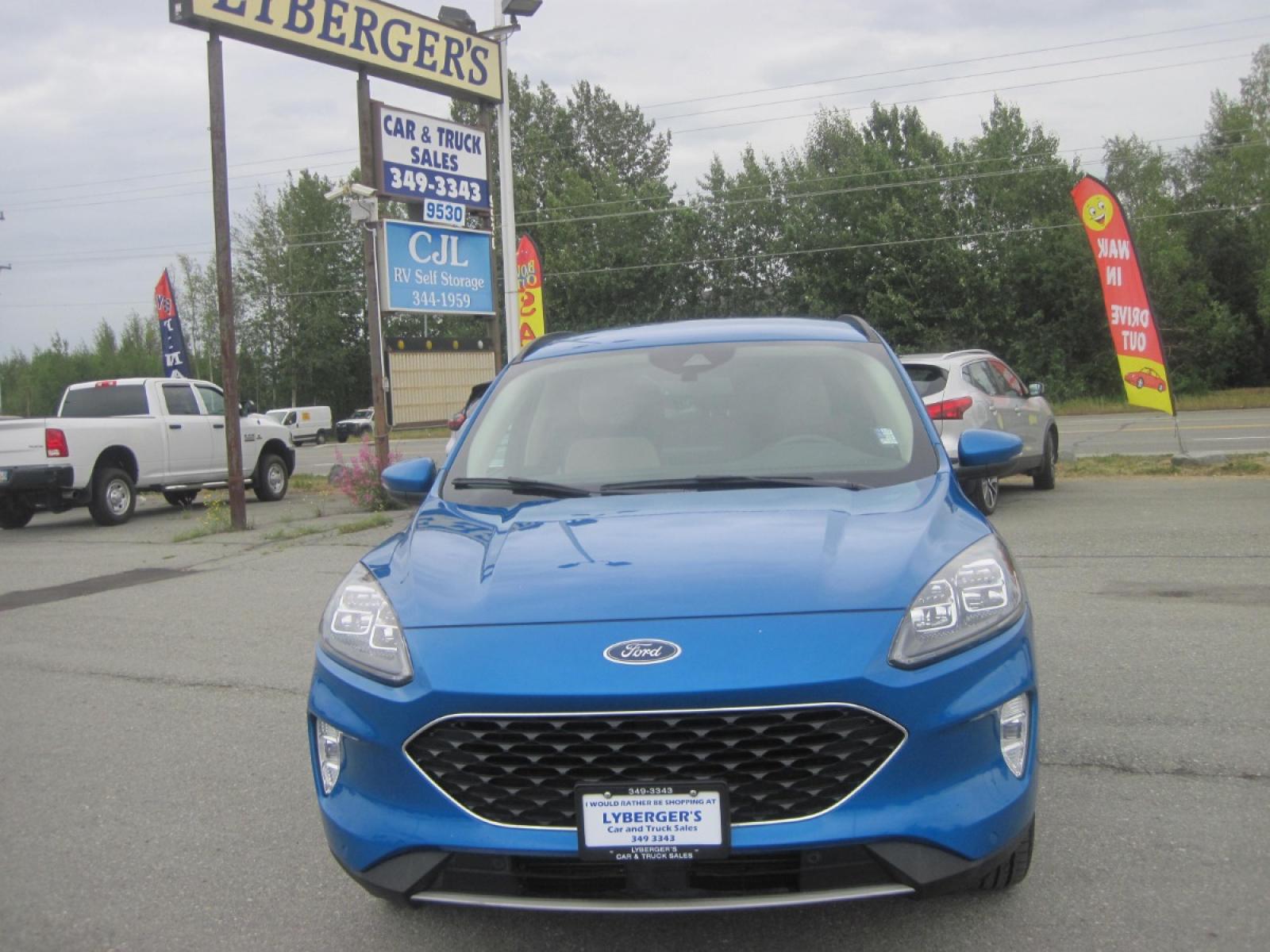 2020 blue /Tan Ford Escape Titanium 4WD (1FMCU9J90LU) with an 2.0L L4 DOHC 16V engine, 6A transmission, located at 9530 Old Seward Highway, Anchorage, AK, 99515, (907) 349-3343, 61.134140, -149.865570 - Nice Ford Escape Titanuim 4wd tow package, come take a test drive. - Photo #1