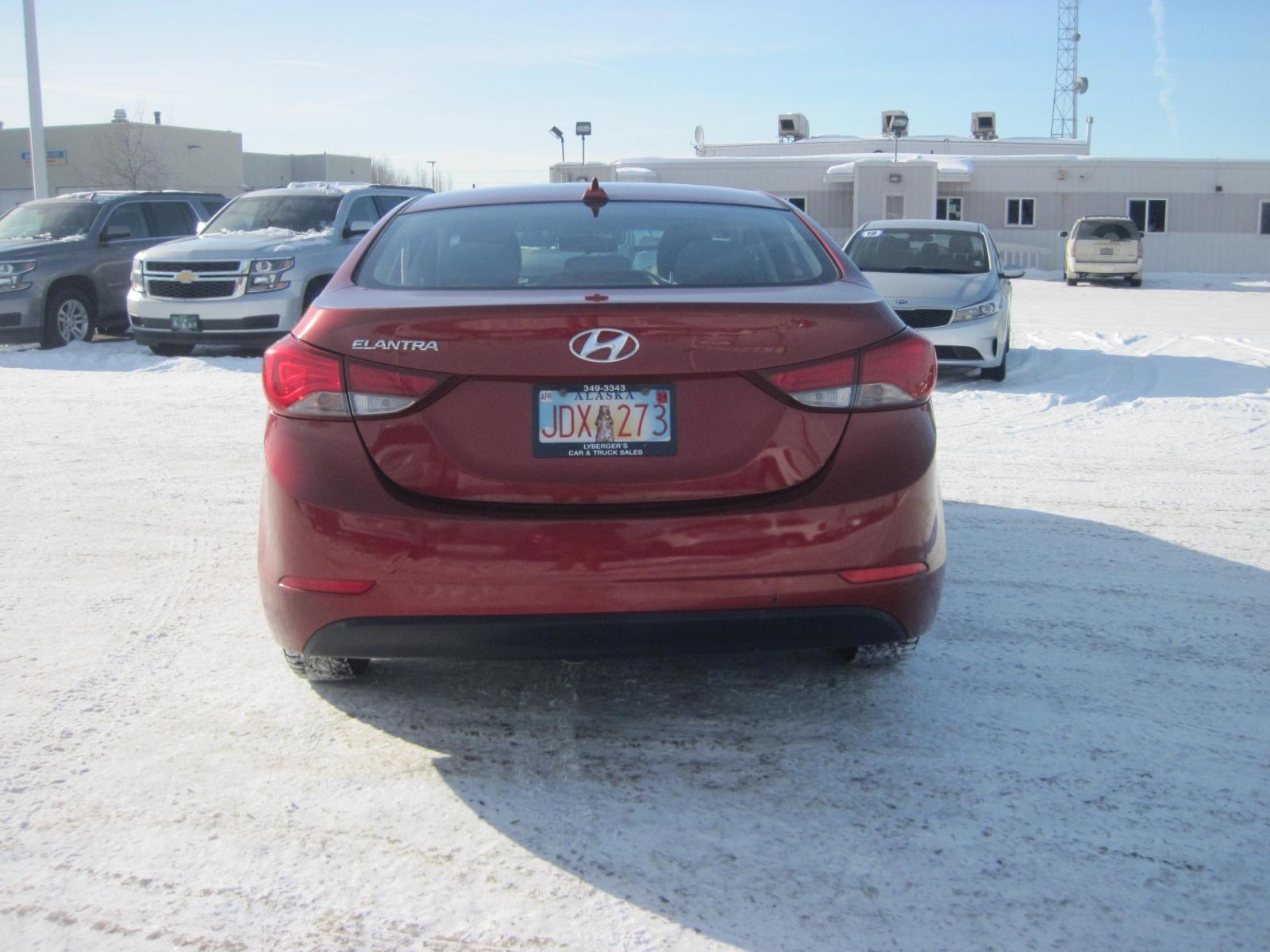 2016 red /black Hyundai Elantra SE (5NPDH4AE2GH) with an 1.8L L4 DOHC 16V engine, 6-Speed Automatic transmission, located at 9530 Old Seward Highway, Anchorage, AK, 99515, (907) 349-3343, 61.134140, -149.865570 - Low miles on this Huundai Elantra SE - Photo #3