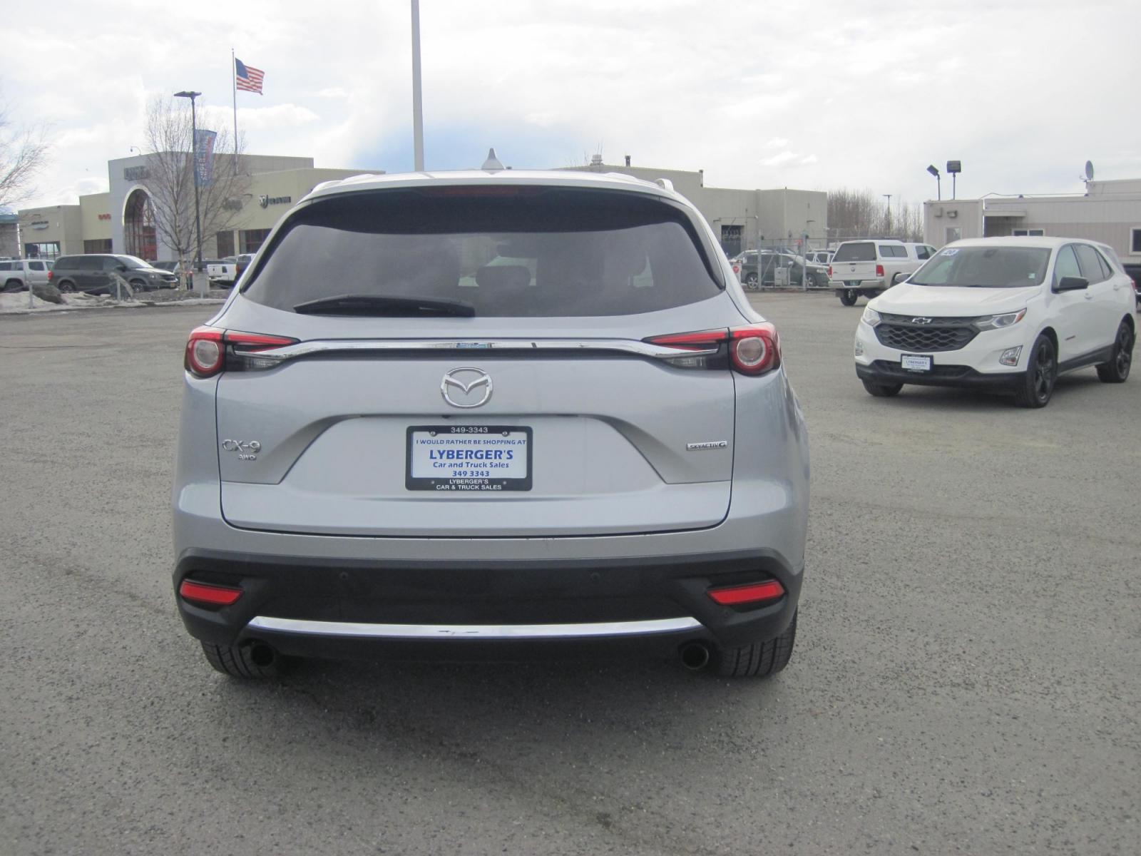2021 silver /black Mazda CX-9 Grand Touring AWD (JM3TCBDY5M0) with an 2.5L L4 DOHC 16V engine, 6A transmission, located at 9530 Old Seward Highway, Anchorage, AK, 99515, (907) 349-3343, 61.134140, -149.865570 - Nice Mazda CX-9 Grand Touring AWD, sun roof , leather seats, power liftgate, come take a test drive. - Photo #3