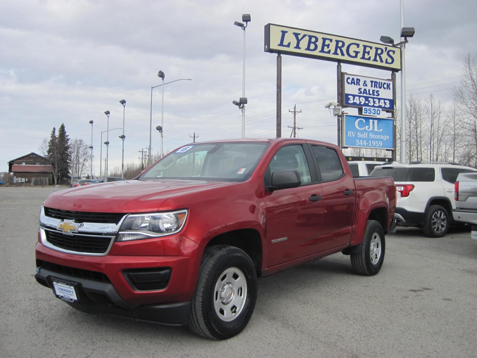 2015 red /black Chevrolet Colorado Crew Cab 4WD (1GCGTAE31F1) with an 3.6L V6 DOHC 24V GAS engine, 6-Speed Automatic transmission, located at 9530 Old Seward Highway, Anchorage, AK, 99515, (907) 349-3343, 61.134140, -149.865570 - Low miles on this Chevrolet Colorado , come take a test drive. - Photo #0