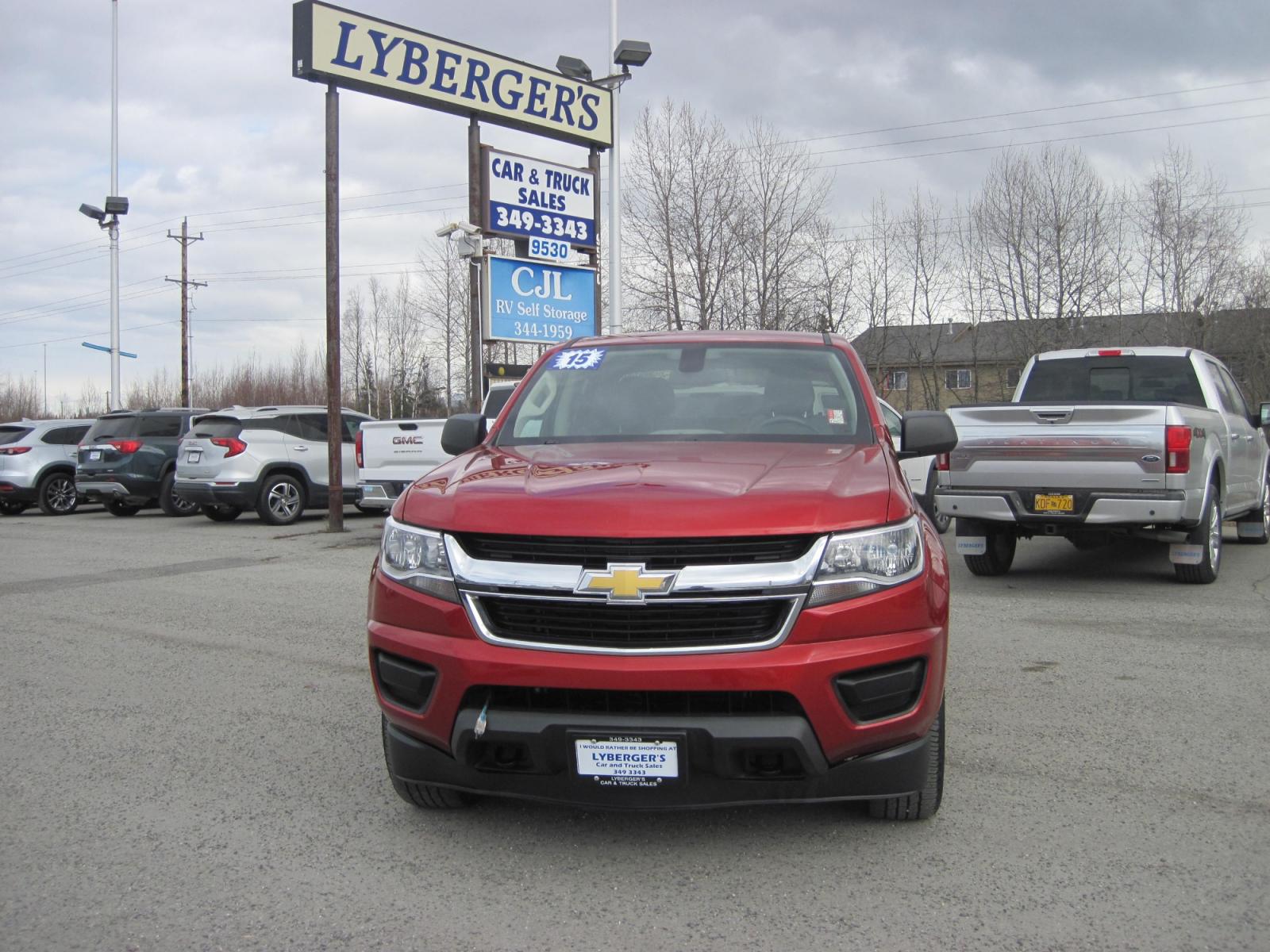 2015 red /black Chevrolet Colorado Crew Cab 4WD (1GCGTAE31F1) with an 3.6L V6 DOHC 24V GAS engine, 6-Speed Automatic transmission, located at 9530 Old Seward Highway, Anchorage, AK, 99515, (907) 349-3343, 61.134140, -149.865570 - Photo #1