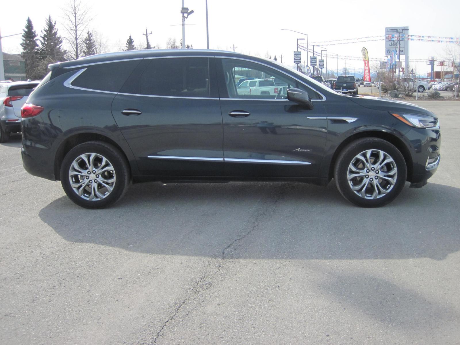 2021 Maroon /black Buick Enclave Avenir AWD (5GAEVCKW7MJ) with an 3.6L V6 DOHC 24V engine, 9A transmission, located at 9530 Old Seward Highway, Anchorage, AK, 99515, (907) 349-3343, 61.134140, -149.865570 - Photo #2