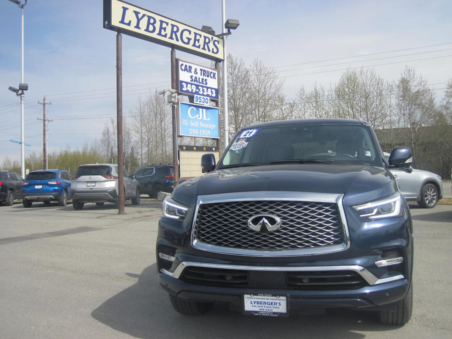 2021 blue /black Infiniti QX80 Luxe 4WD (JN8AZ2AEXM9) with an 5.6L V8 DOHC 32V engine, 7A transmission, located at 9530 Old Seward Highway, Anchorage, AK, 99515, (907) 349-3343, 61.134140, -149.865570 - Photo#1