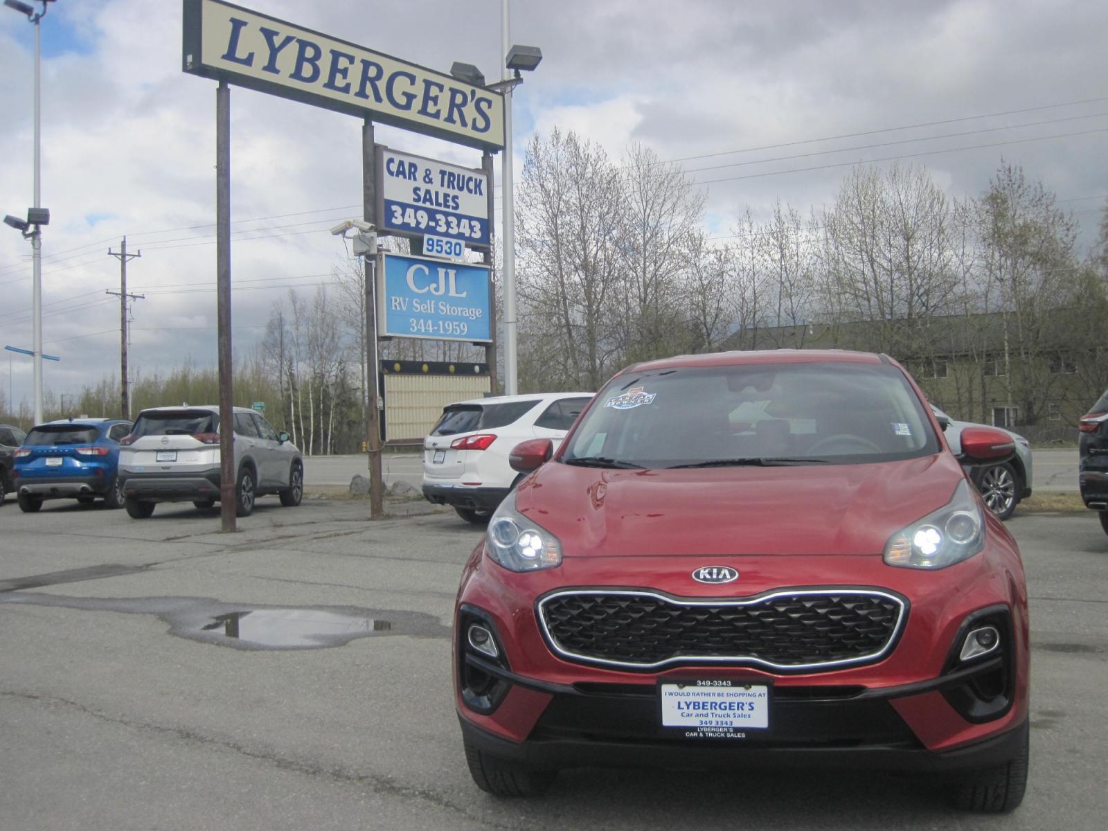 2022 red /black Kia Sportage LX AWD (KNDPMCAC1N7) with an 2.4L V6 DOHC 24V engine, 6A transmission, located at 9530 Old Seward Highway, Anchorage, AK, 99515, (907) 349-3343, 61.134140, -149.865570 - Photo #1