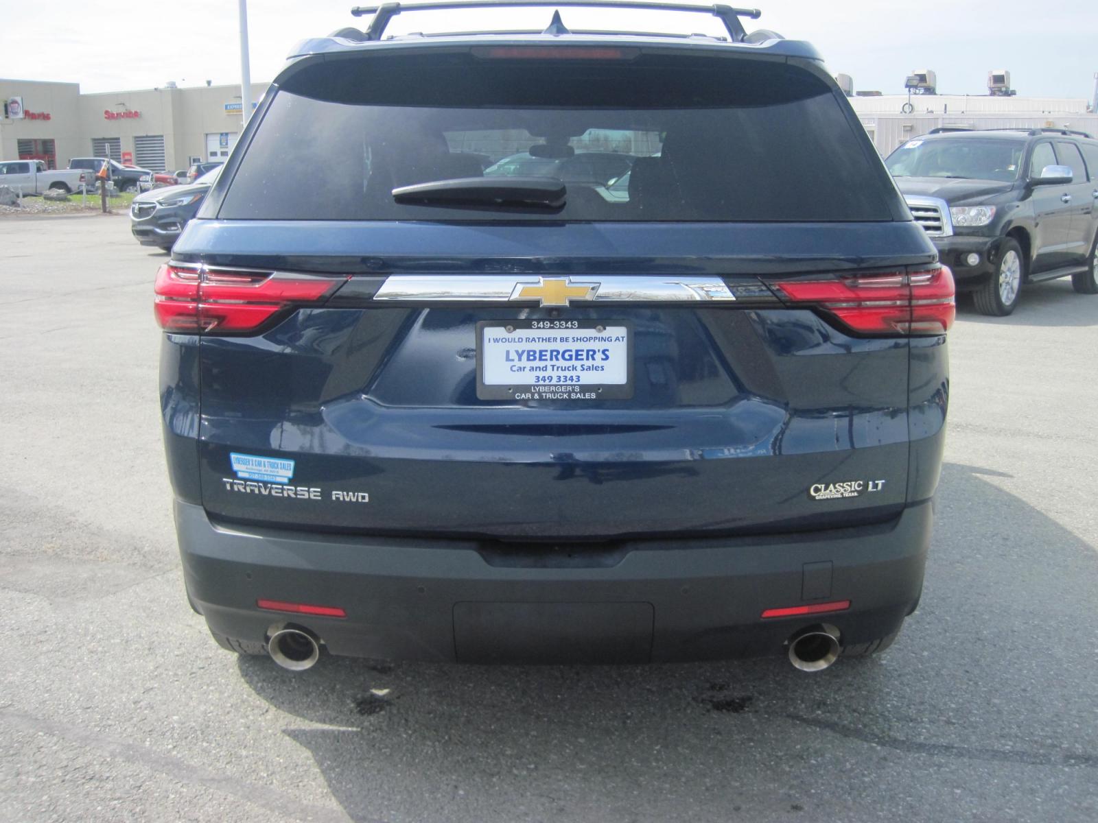 2023 blue /black Chevrolet Traverse LT Cloth AWD (1GNEVGKW3PJ) with an 3.6L V6 DOHC 24V engine, 9A transmission, located at 9530 Old Seward Highway, Anchorage, AK, 99515, (907) 349-3343, 61.134140, -149.865570 - 2023 Chevrolet Traverse, tow package, luggage rack, 4 captain chairs come take a test drive. - Photo #3