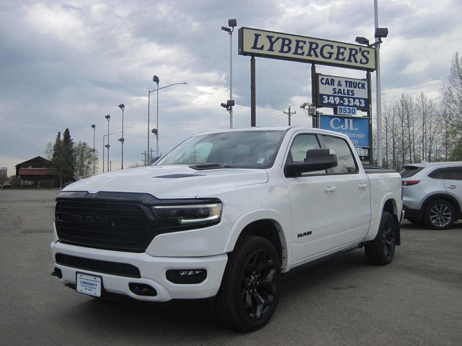 2021 white /black RAM 1500 Limited Crew Cab SWB 4WD (1C6SRFHT5MN) with an 5.7L V8 OHV 16V engine, 8A transmission, located at 9530 Old Seward Highway, Anchorage, AK, 99515, (907) 349-3343, 61.134140, -149.865570 - Loaded Ram 1500 Limited, come take a test drive - Photo #0