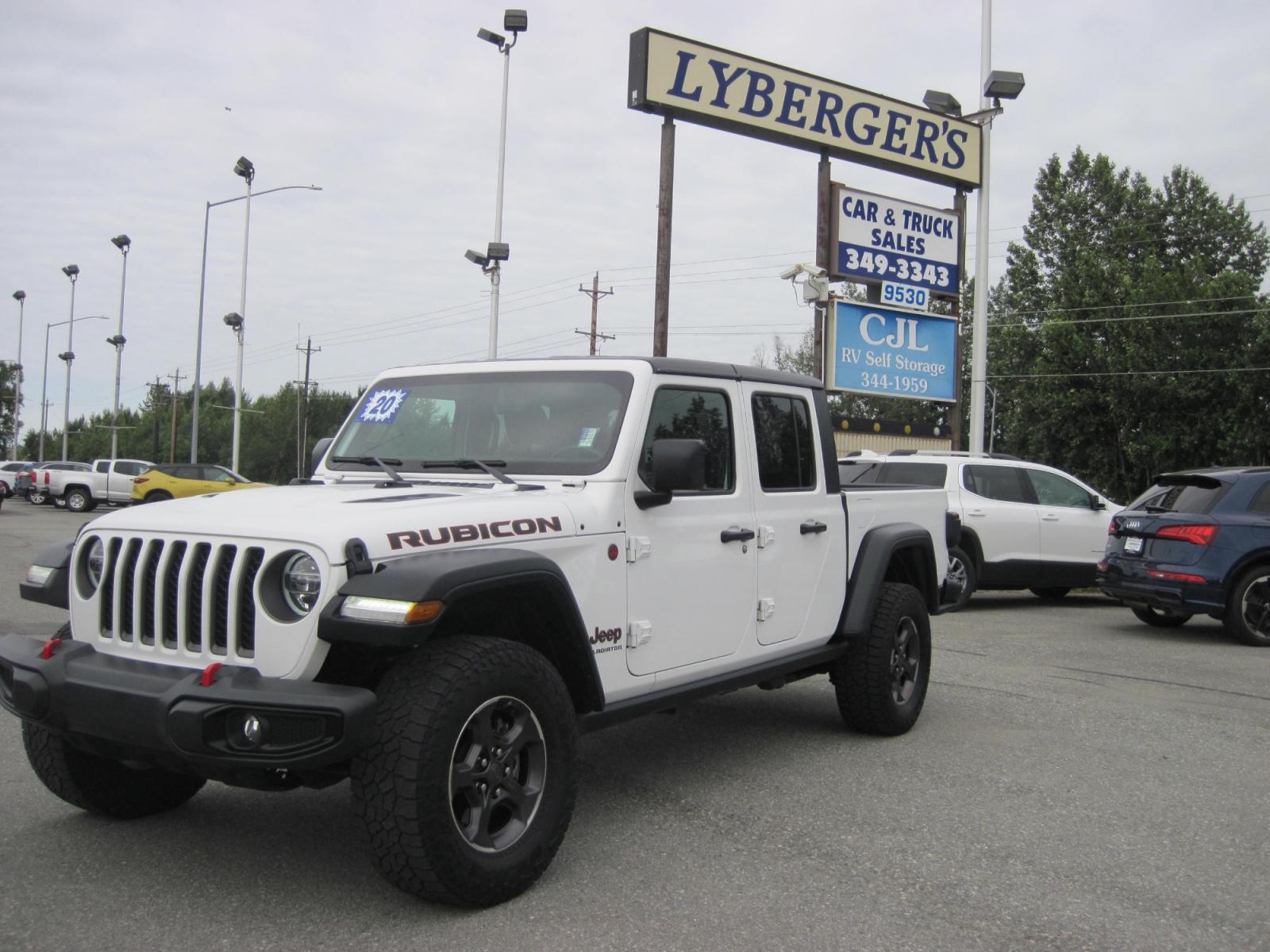 2020 white /black Jeep Gladiator Rubicon (1C6JJTBG1LL) with an 3.6L V6 DOHC 24V engine, 6M transmission, located at 9530 Old Seward Highway, Anchorage, AK, 99515, (907) 349-3343, 61.134140, -149.865570 - Nice Jeep Gladiator Rubicon, Leather seats, Navigation come take a test drive. - Photo #0