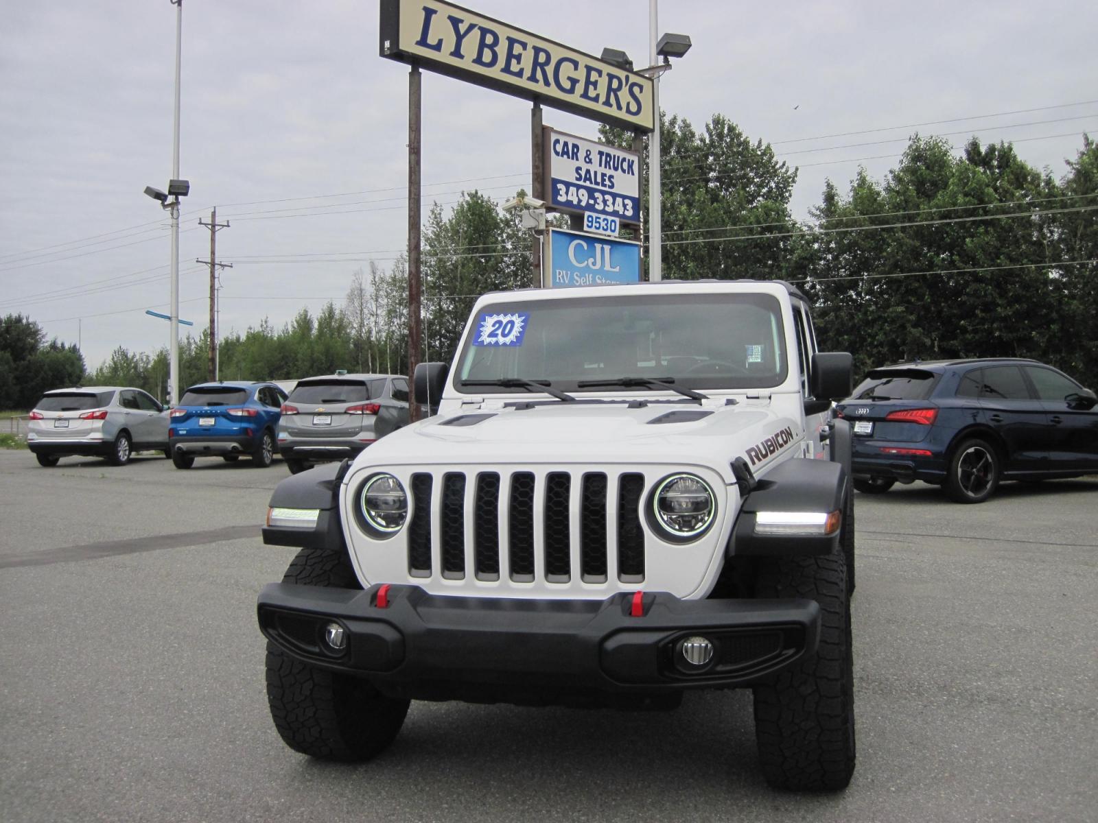 2020 white /black Jeep Gladiator Rubicon (1C6JJTBG1LL) with an 3.6L V6 DOHC 24V engine, 6M transmission, located at 9530 Old Seward Highway, Anchorage, AK, 99515, (907) 349-3343, 61.134140, -149.865570 - Nice Jeep Gladiator Rubicon, Leather seats, Navigation come take a test drive. - Photo #1