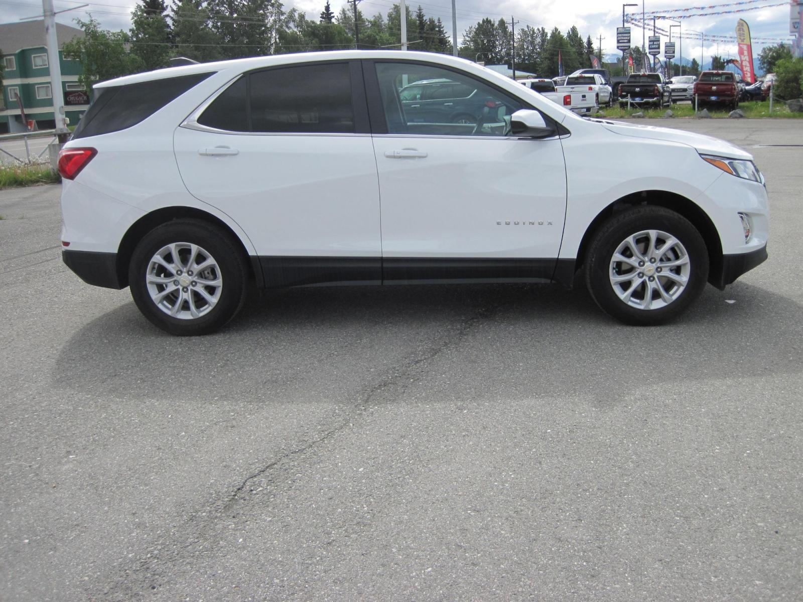 2021 white /black Chevrolet Equinox LT AWD (3GNAXTEV6MS) with an 1.5L L4 DOHC 16V TURBO engine, 6A transmission, located at 9530 Old Seward Highway, Anchorage, AK, 99515, (907) 349-3343, 61.134140, -149.865570 - Photo #2