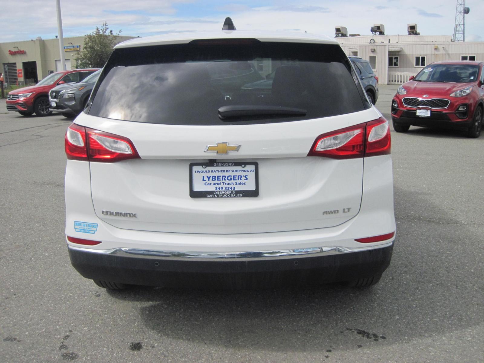 2021 white /black Chevrolet Equinox LT AWD (3GNAXTEV6MS) with an 1.5L L4 DOHC 16V TURBO engine, 6A transmission, located at 9530 Old Seward Highway, Anchorage, AK, 99515, (907) 349-3343, 61.134140, -149.865570 - Photo #3