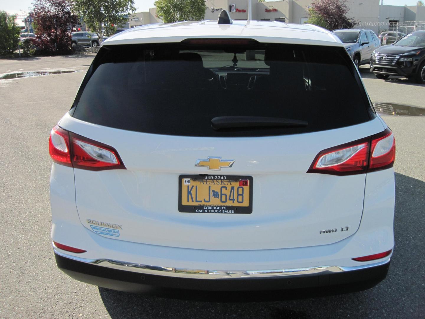 2021 white /black Chevrolet Equinox LT AWD (3GNAXTEV6MS) with an 1.5L L4 DOHC 16V TURBO engine, 6A transmission, located at 9530 Old Seward Highway, Anchorage, AK, 99515, (907) 349-3343, 61.134140, -149.865570 - Nice Chevrolet Equinox AWD come take a test drive- Photo#5