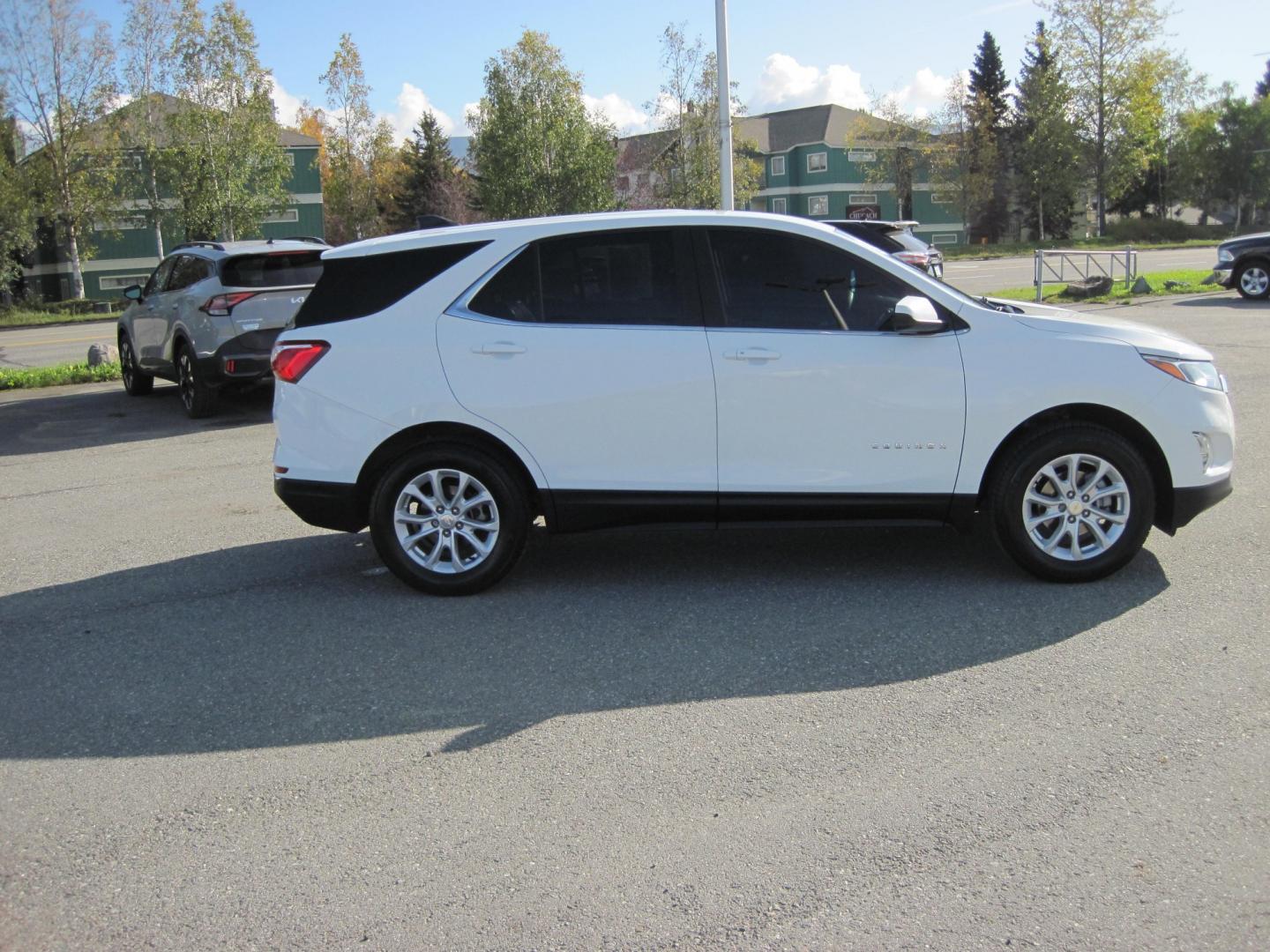 2021 white /black Chevrolet Equinox LT AWD (3GNAXTEV6MS) with an 1.5L L4 DOHC 16V TURBO engine, 6A transmission, located at 9530 Old Seward Highway, Anchorage, AK, 99515, (907) 349-3343, 61.134140, -149.865570 - Nice Chevrolet Equinox AWD come take a test drive- Photo#4