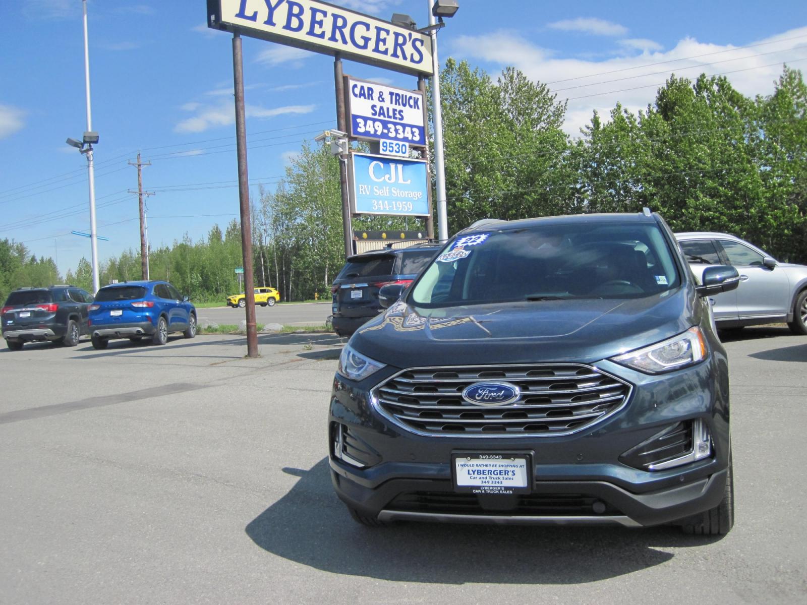2022 blue /black Ford Edge Titanium AWD (2FMPK4K91NB) with an 2.0L L4 DOHC 16V engine, 6A transmission, located at 9530 Old Seward Highway, Anchorage, AK, 99515, (907) 349-3343, 61.134140, -149.865570 - Nice Ford Edge Titanium AWD, come take a test drive - Photo #1