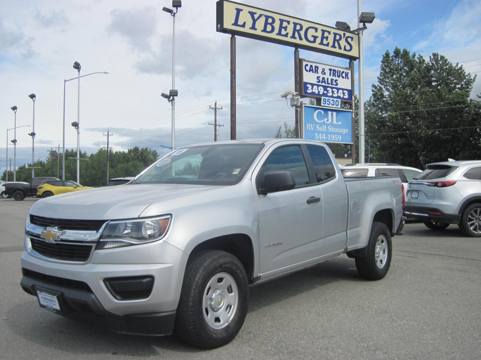 2015 silver /gray Chevrolet Colorado WT Ext. Cab 4WD (1GCHTAEAXF1) with an 2.5L L4 DOHC 16V GAS engine, 6-Speed Automatic transmission, located at 9530 Old Seward Highway, Anchorage, AK, 99515, (907) 349-3343, 61.134140, -149.865570 - Low Miles on this Chevrolet colorado 4wd - Photo #0