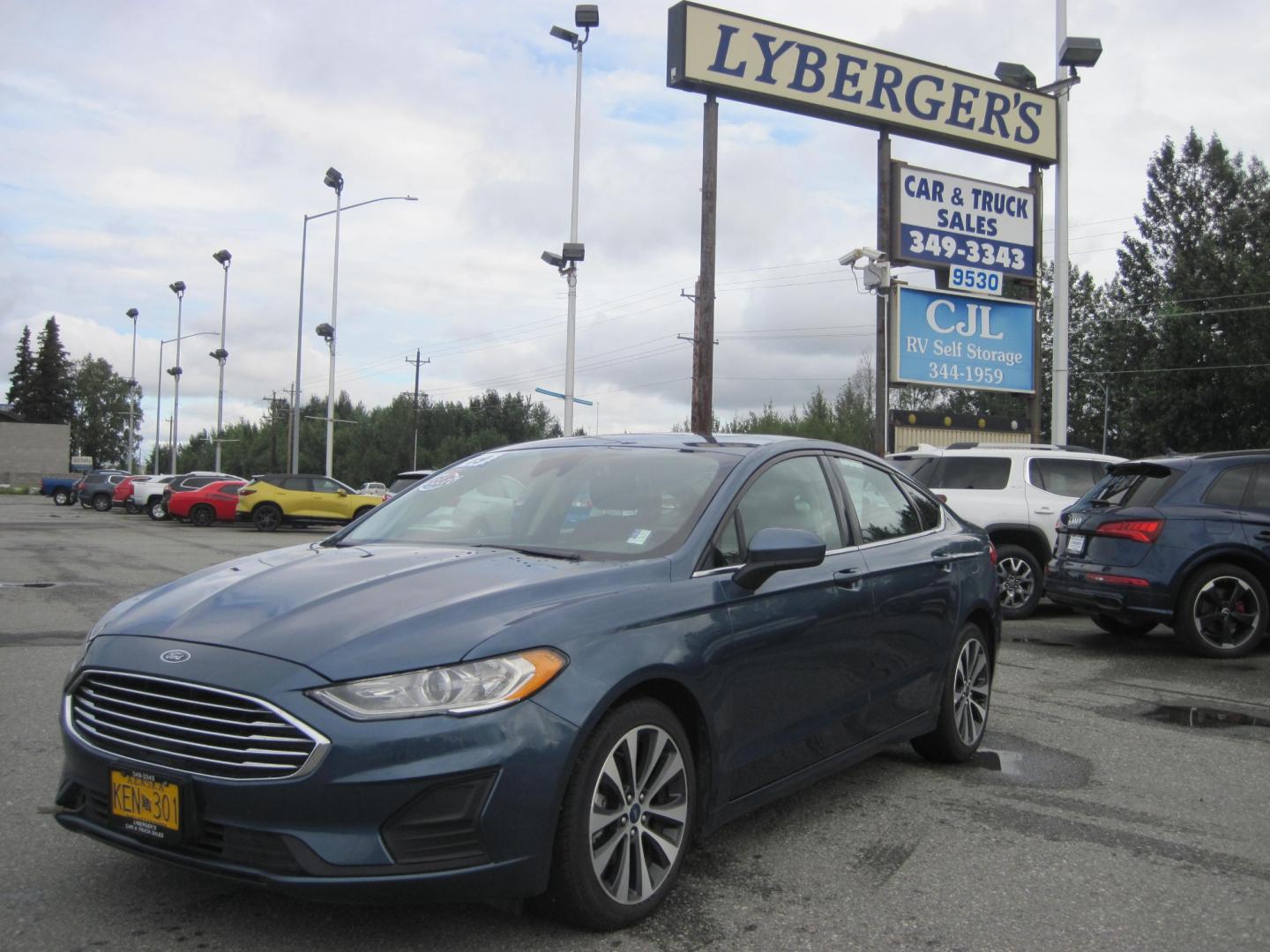 2019 blue /black Ford Fusion SE AWD (3FA6P0T94KR) with an 2.0L L4 DOHC 16V engine, 6-Speed Automatic transmission, located at 9530 Old Seward Highway, Anchorage, AK, 99515, (907) 349-3343, 61.134140, -149.865570 - Photo#0