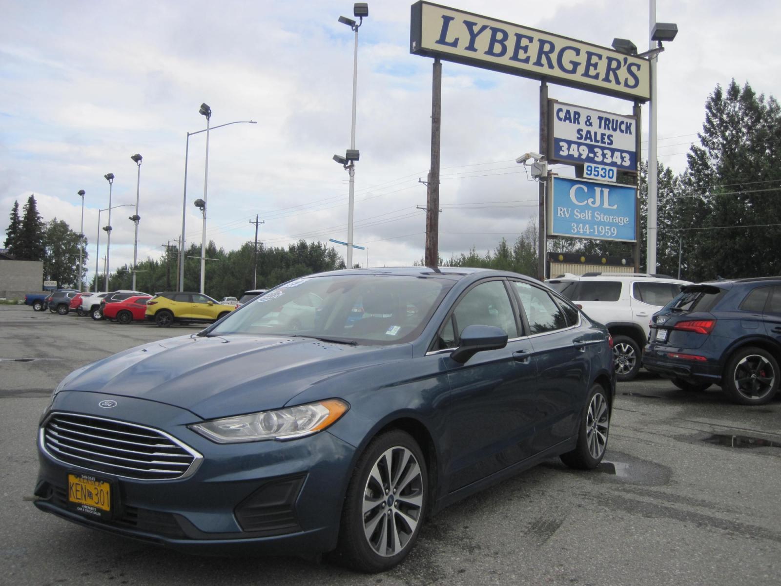 2019 blue /black Ford Fusion SE AWD (3FA6P0T94KR) with an 2.0L L4 DOHC 16V engine, 6-Speed Automatic transmission, located at 9530 Old Seward Highway, Anchorage, AK, 99515, (907) 349-3343, 61.134140, -149.865570 - Nice Ford Fusion AWD , Sunroof come take a test drive. - Photo #0