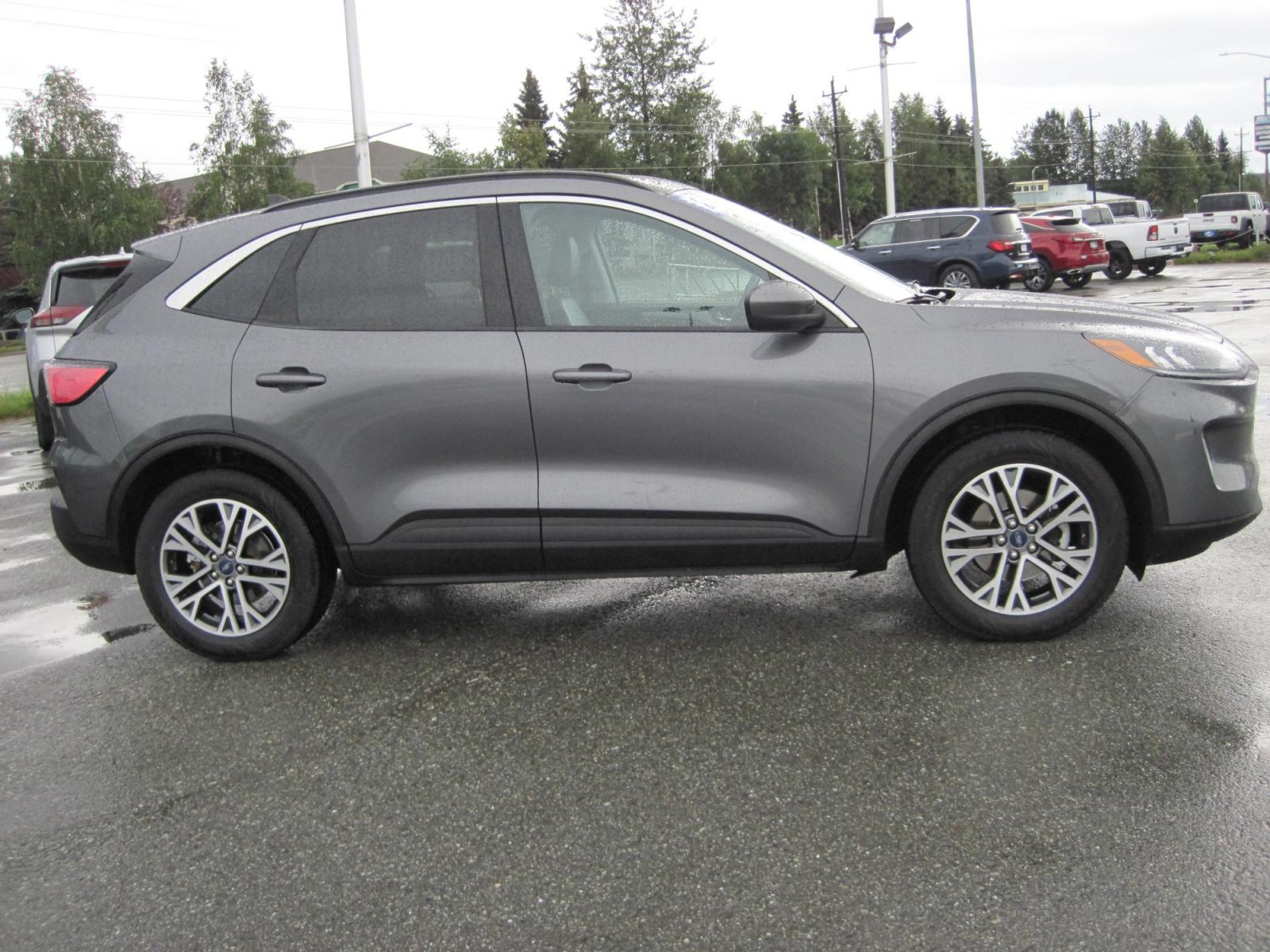 2021 gray Ford Escape SEL AWD (1FMCU9H63MU) with an 1.5L L3 engine, 6A transmission, located at 9530 Old Seward Highway, Anchorage, AK, 99515, (907) 349-3343, 61.134140, -149.865570 - Nice Ford escape SEL sunroof come take a test drive - Photo #2