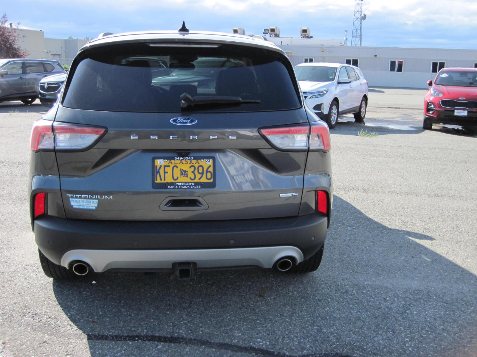 2020 gray /black Ford Escape Titanium 4WD (1FMCU9J98LU) with an 2.0L L4 DOHC 16V engine, 6A transmission, located at 9530 Old Seward Highway, Anchorage, AK, 99515, (907) 349-3343, 61.134140, -149.865570 - Nice Ford Escape Titanium 4WD tow package come take a test drive - Photo #4