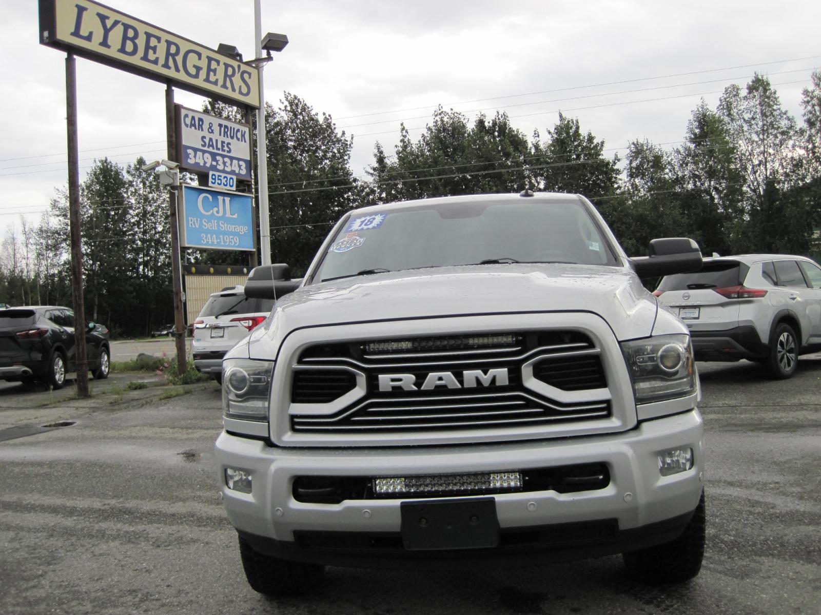 2018 silver /black RAM 3500 Laramie Mega Cab 4WD (3C63R3ML1JG) with an 6.7L L6 OHV 24V TURBO DIESEL engine, 6A transmission, located at 9530 Old Seward Highway, Anchorage, AK, 99515, (907) 349-3343, 61.134140, -149.865570 - Nice Ram 3500 Laramie Mega Cab come take a test drive - Photo #2
