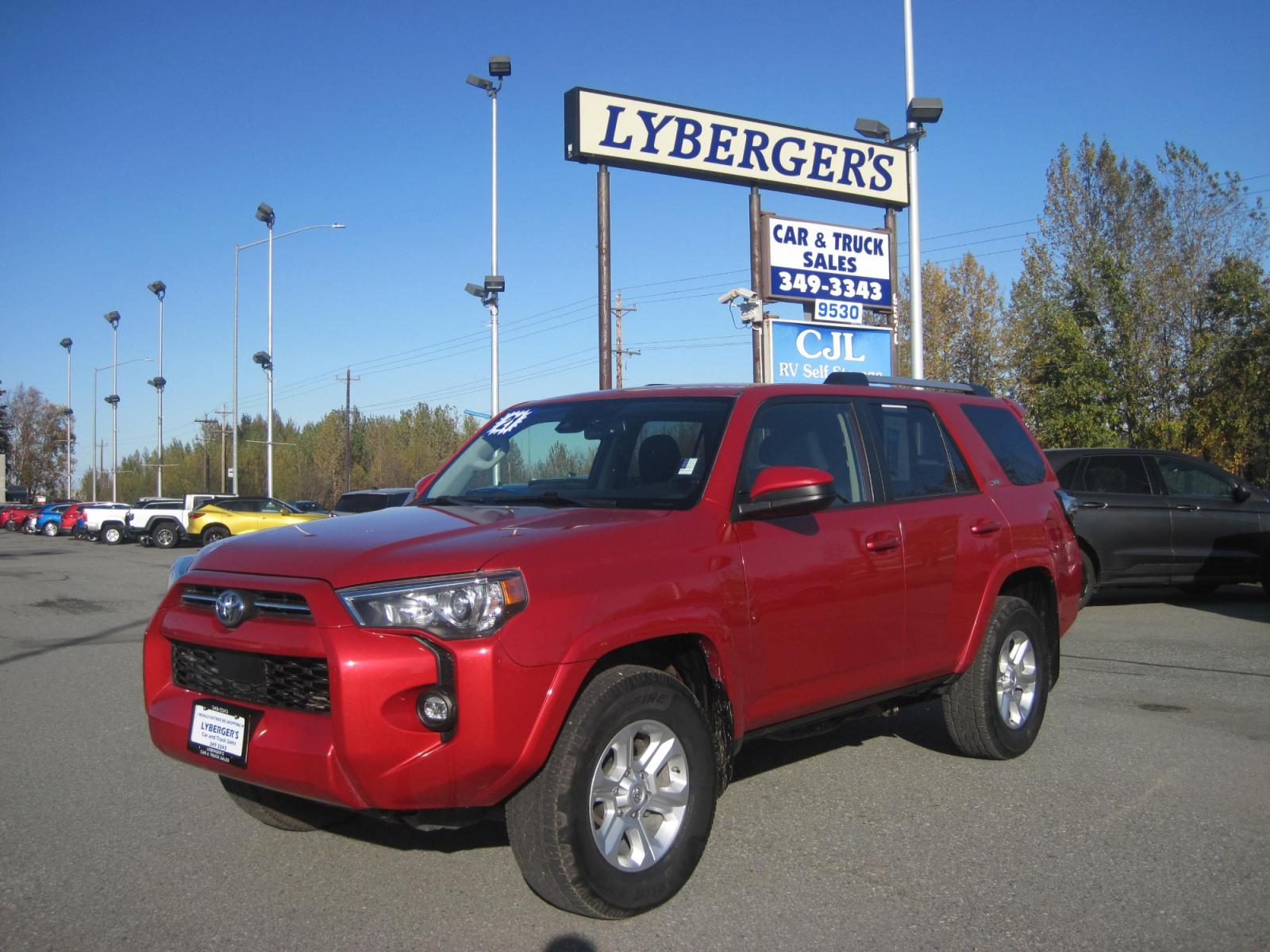 2021 red /black Toyota 4Runner SR5 4WD (JTEMU5JR5M5) with an 4.0L V6 DOHC 24V engine, 5A transmission, located at 9530 Old Seward Highway, Anchorage, AK, 99515, (907) 349-3343, 61.134140, -149.865570 - Nice Toyota 4 Runner SR5 4wd with third row and tow package come take a test drive - Photo #1