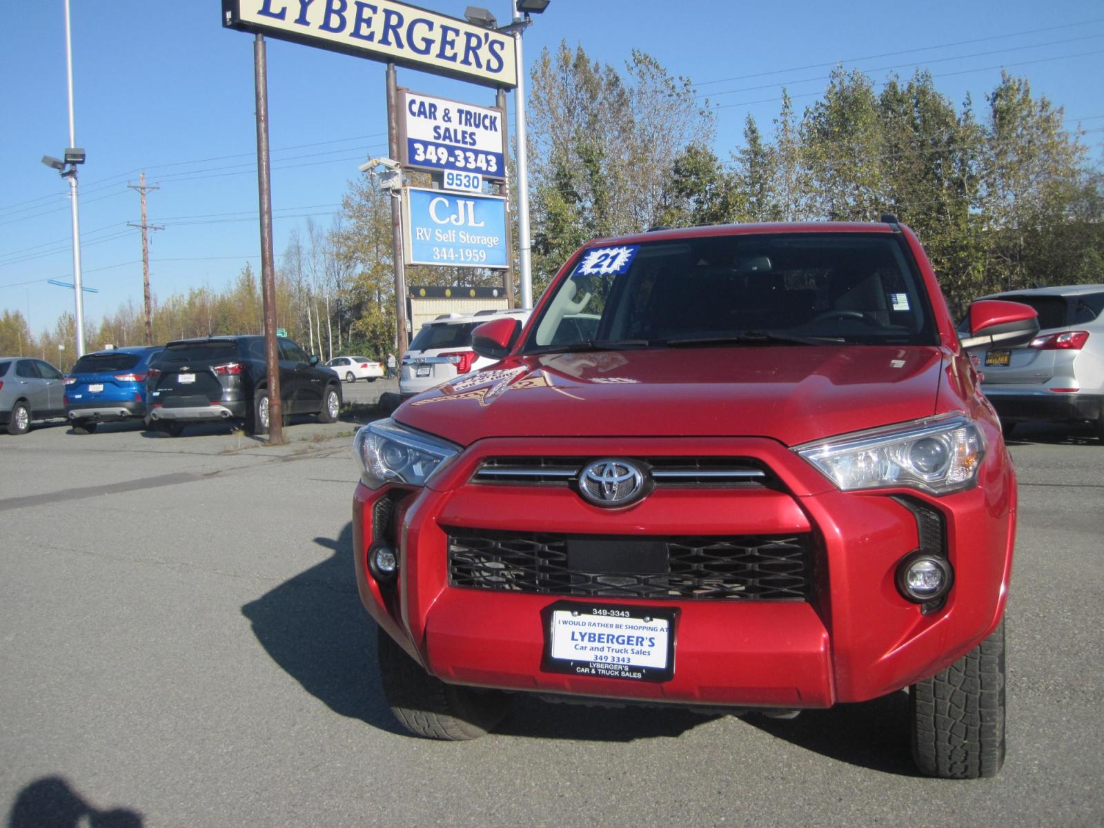 2021 red /black Toyota 4Runner SR5 4WD (JTEMU5JR5M5) with an 4.0L V6 DOHC 24V engine, 5A transmission, located at 9530 Old Seward Highway, Anchorage, AK, 99515, (907) 349-3343, 61.134140, -149.865570 - Nice Toyota 4 Runner SR5 4wd with third row and tow package come take a test drive - Photo #2