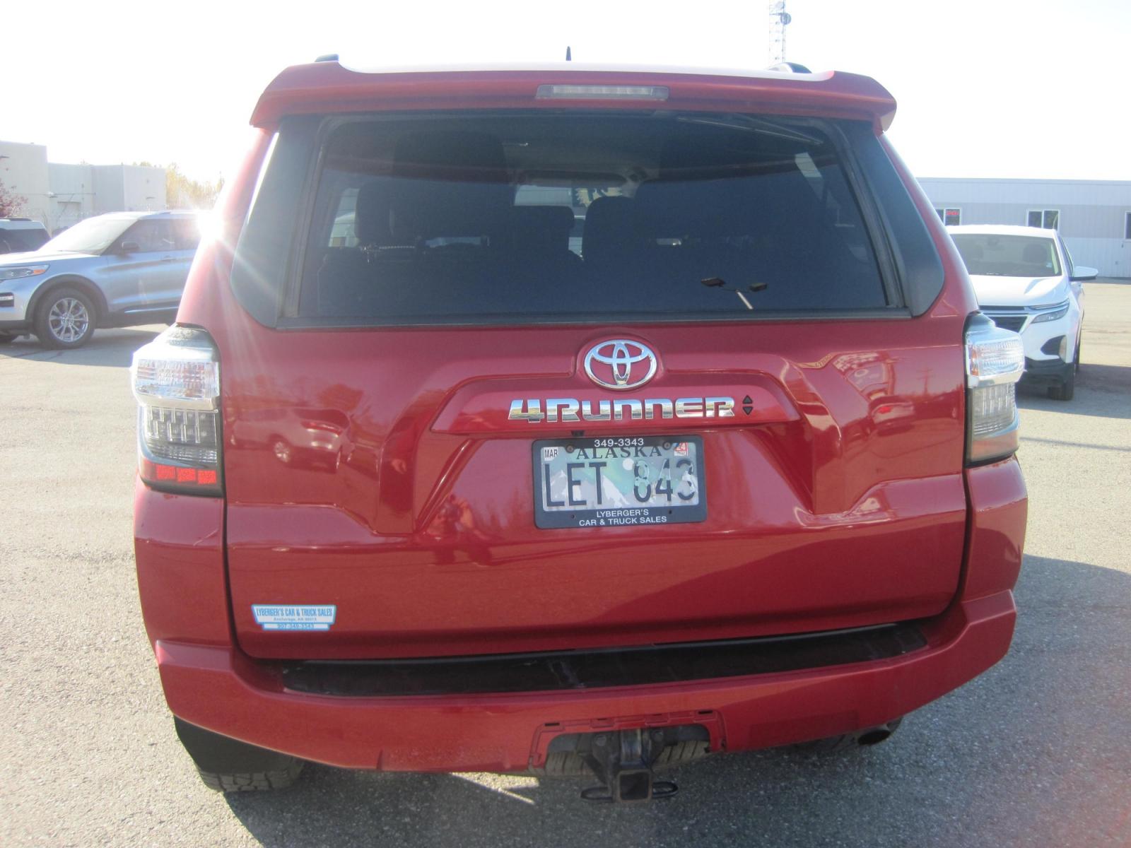 2021 red /black Toyota 4Runner SR5 4WD (JTEMU5JR5M5) with an 4.0L V6 DOHC 24V engine, 5A transmission, located at 9530 Old Seward Highway, Anchorage, AK, 99515, (907) 349-3343, 61.134140, -149.865570 - Nice Toyota 4 Runner SR5 4wd with third row and tow package come take a test drive - Photo #4