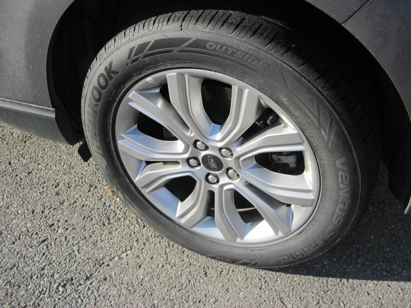 2023 gray /black Ford Edge Titanium (2FMPK4K99PB) with an 2.0L L4 DOHC 16V engine, 6A transmission, located at 9530 Old Seward Highway, Anchorage, AK, 99515, (907) 349-3343, 61.134140, -149.865570 - Photo#7