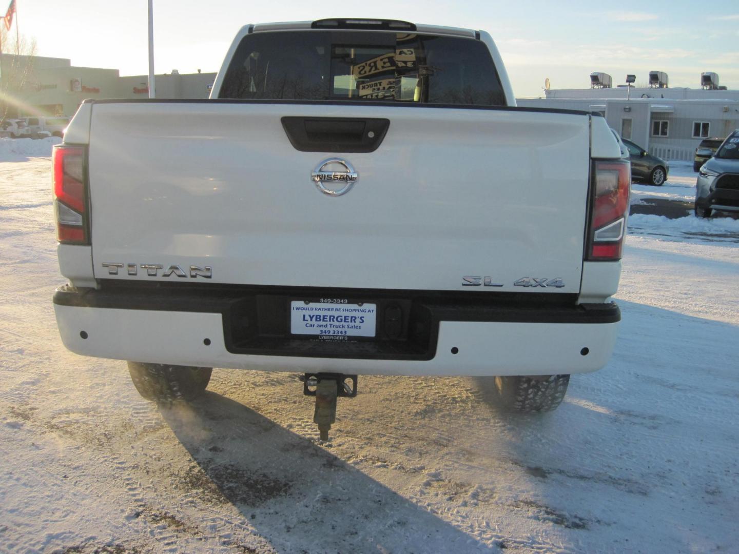 2021 white /black Nissan Titan SL Crew Cab 4WD (1N6AA1ED5MN) with an 5.6L V8 DOHC 32V engine, 9A transmission, located at 9530 Old Seward Highway, Anchorage, AK, 99515, (907) 349-3343, 61.134140, -149.865570 - Loaded Nissan Titan SL, sunroof, fender sound system, come take a test drive. - Photo#2