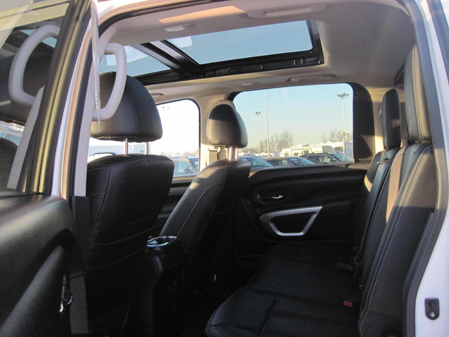 2021 white /black Nissan Titan SL Crew Cab 4WD (1N6AA1ED5MN) with an 5.6L V8 DOHC 32V engine, 9A transmission, located at 9530 Old Seward Highway, Anchorage, AK, 99515, (907) 349-3343, 61.134140, -149.865570 - Loaded Nissan Titan SL, sunroof, fender sound system, come take a test drive. - Photo#4