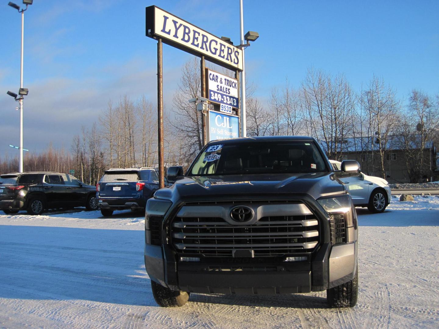 2023 gray /black Toyota Tundra Limited CrewMax 4WD Long Bed (5TFJA5EC8PX) with an 3.4L V6 DOHC 24V engine, 6A transmission, located at 9530 Old Seward Highway, Anchorage, AK, 99515, (907) 349-3343, 61.134140, -149.865570 - Nice Toyota Tundra Limited has a brand new deck system with storage in the bed of truck, come take a test drive - Photo#0