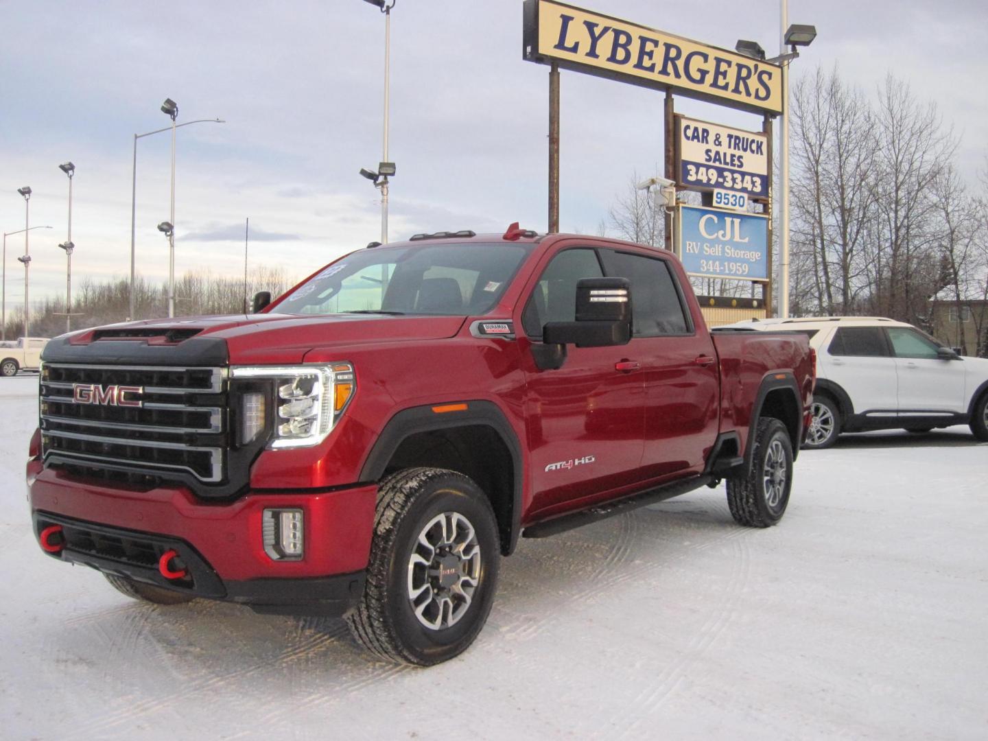 2022 red /black GMC Sierra 2500HD AT4 Crew Cab 4WD (1GT49PEY2NF) with an 6.6L V8 OHV 16 DIESEL engine, 6A transmission, located at 9530 Old Seward Highway, Anchorage, AK, 99515, (907) 349-3343, 61.134140, -149.865570 - Loaded GMC Sierra 2500 Diesel come take a test drive. - Photo#0