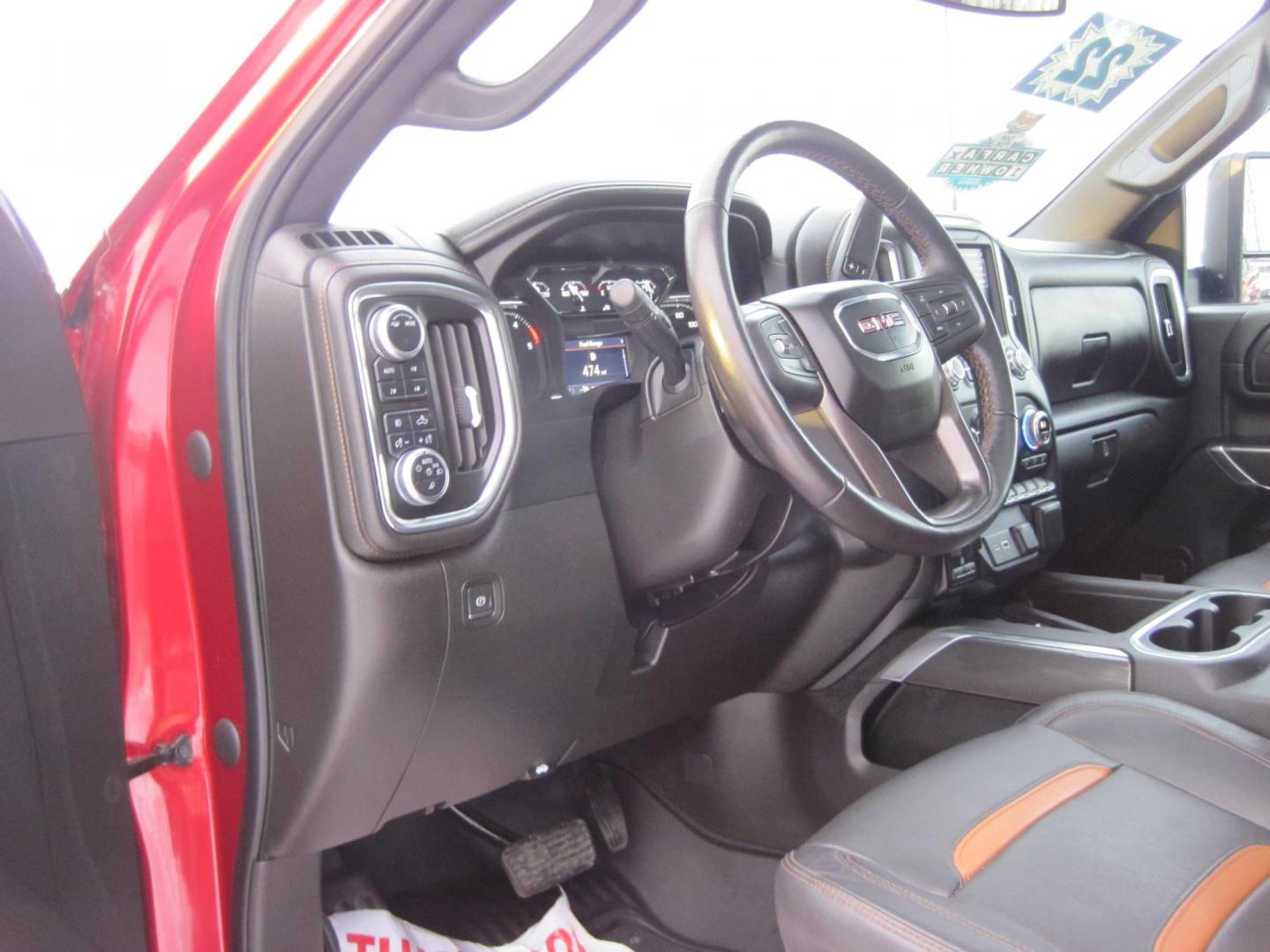 2022 red /black GMC Sierra 2500HD AT4 Crew Cab 4WD (1GT49PEY2NF) with an 6.6L V8 OHV 16 DIESEL engine, 6A transmission, located at 9530 Old Seward Highway, Anchorage, AK, 99515, (907) 349-3343, 61.134140, -149.865570 - Loaded GMC Sierra 2500 Diesel come take a test drive. - Photo#11