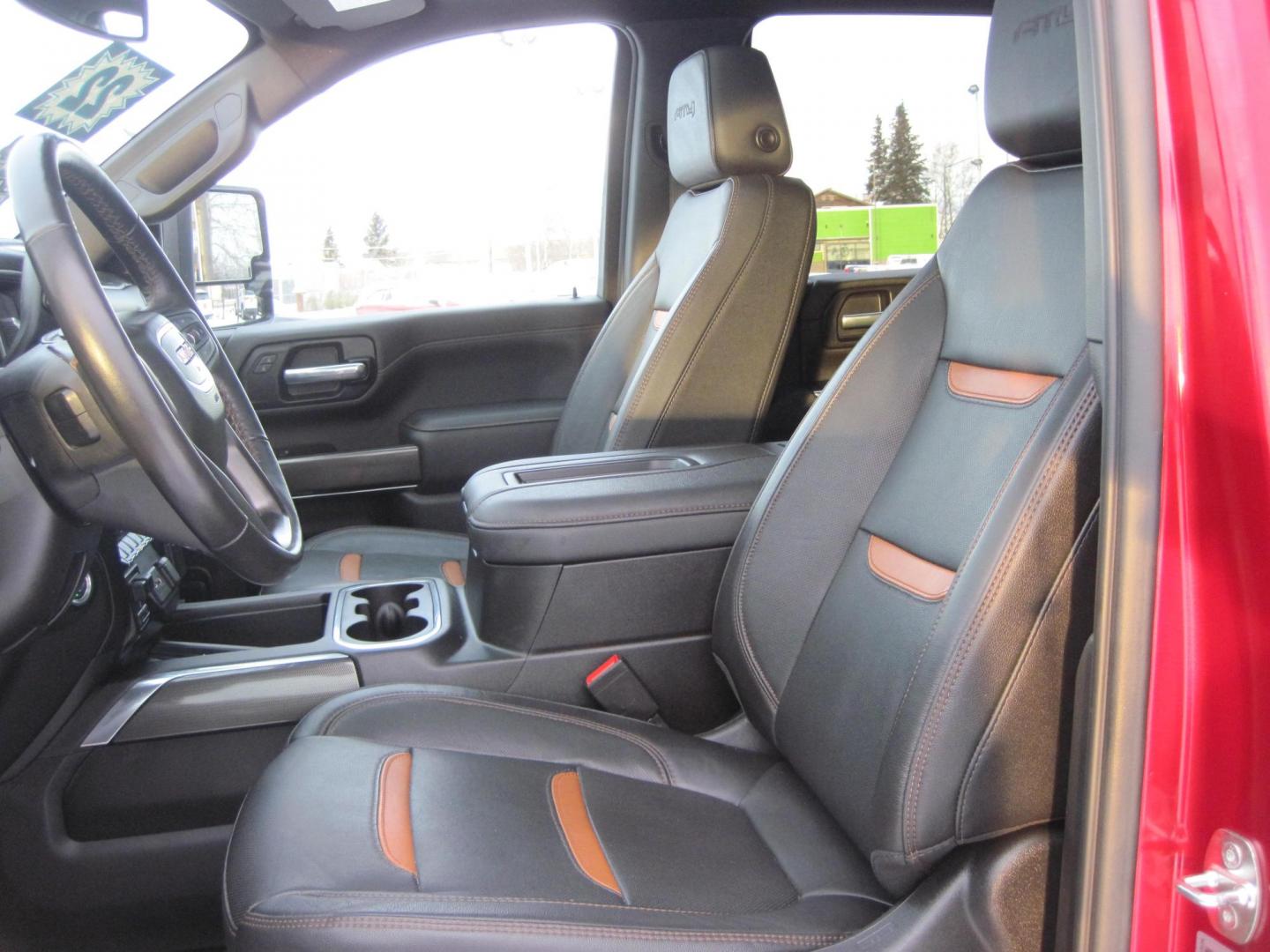 2022 red /black GMC Sierra 2500HD AT4 Crew Cab 4WD (1GT49PEY2NF) with an 6.6L V8 OHV 16 DIESEL engine, 6A transmission, located at 9530 Old Seward Highway, Anchorage, AK, 99515, (907) 349-3343, 61.134140, -149.865570 - Loaded GMC Sierra 2500 Diesel come take a test drive. - Photo#12