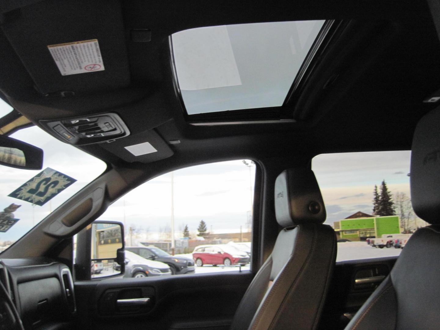 2022 red /black GMC Sierra 2500HD AT4 Crew Cab 4WD (1GT49PEY2NF) with an 6.6L V8 OHV 16 DIESEL engine, 6A transmission, located at 9530 Old Seward Highway, Anchorage, AK, 99515, (907) 349-3343, 61.134140, -149.865570 - Loaded GMC Sierra 2500 Diesel come take a test drive. - Photo#13