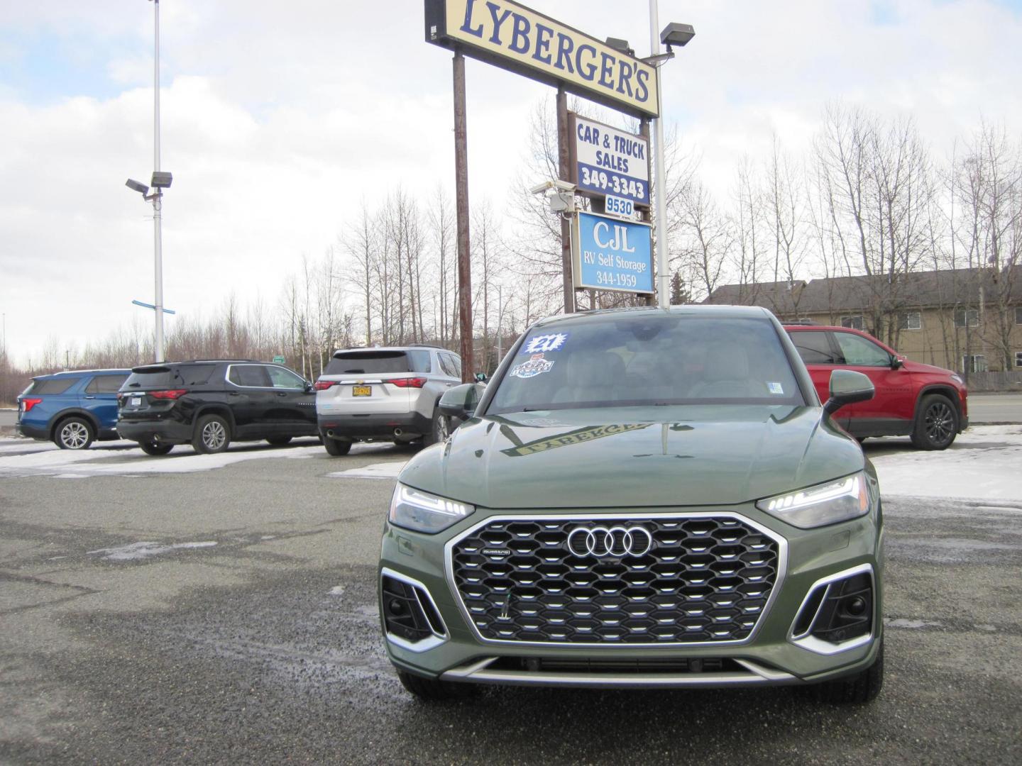 2021 green /gray Audi Q5 Sportback Prestige (WA16AAFY1M2) with an 2.0L L4 DOHC 16V engine, 7A transmission, located at 9530 Old Seward Highway, Anchorage, AK, 99515, (907) 349-3343, 61.134140, -149.865570 - Nice Audi Q5 quattro S-line come take a test drive - Photo#1