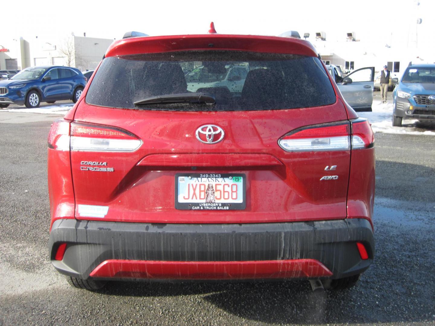 2023 red /black Toyota Corolla Cross LE AWD (7MUBAABGXPV) with an 2.0L L4 DOHC 16V engine, CVT transmission, located at 9530 Old Seward Highway, Anchorage, AK, 99515, (907) 349-3343, 61.134140, -149.865570 - Nice Toyota Corolla Cross LE AWD come take a test drive - Photo#3