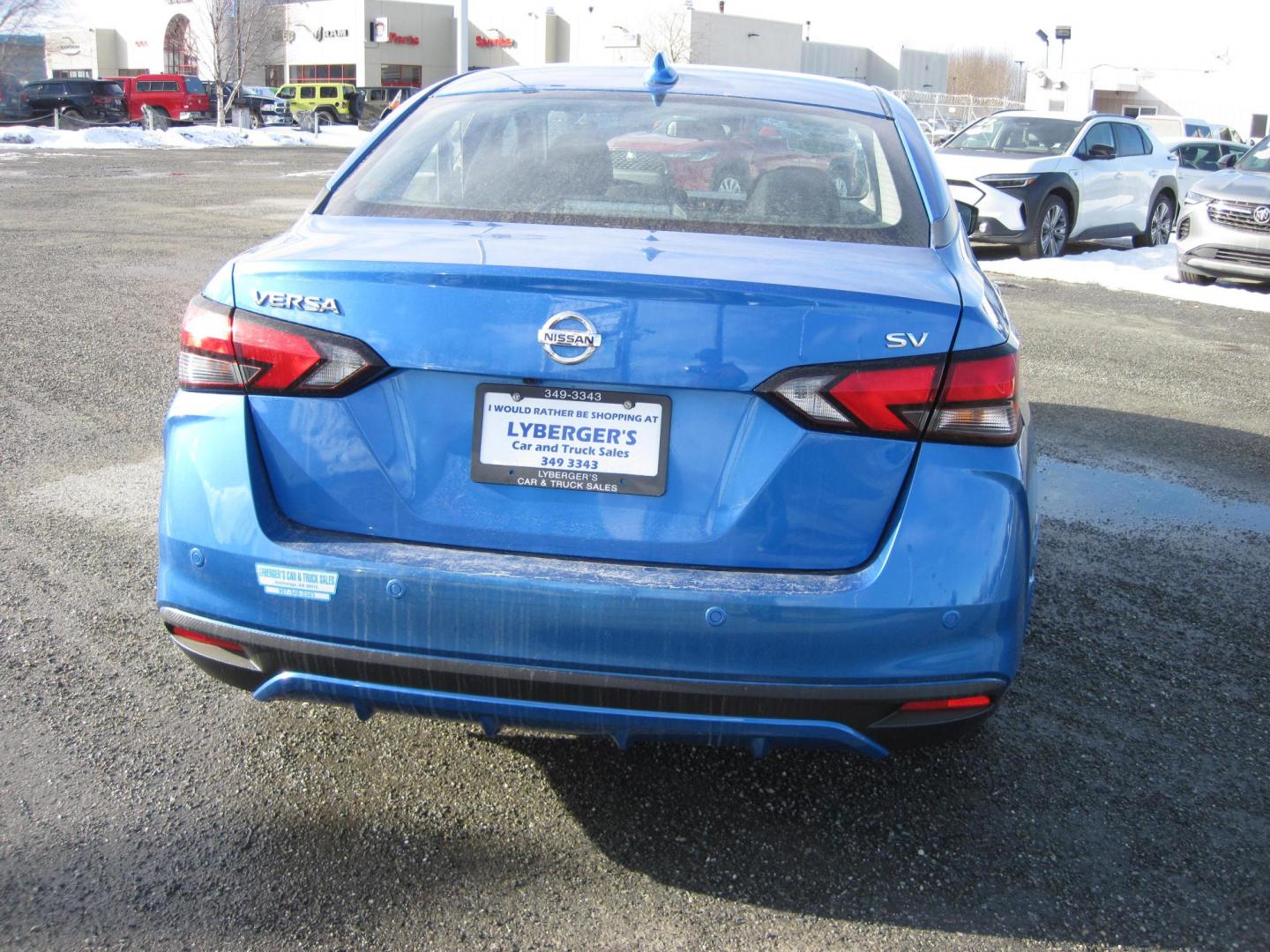 2022 blue /black Nissan Versa SV (3N1CN8EV7NL) with an 1.6L L4 DOHC 16V engine, CVT transmission, located at 9530 Old Seward Highway, Anchorage, AK, 99515, (907) 349-3343, 61.134140, -149.865570 - Nice Nissan Versa SV come take a test drive. - Photo#3