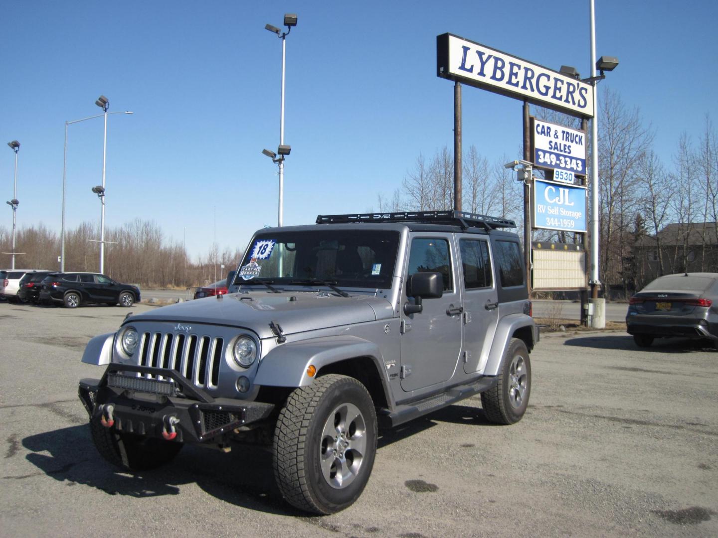 2018 silver /black Jeep Wrangler Unlimited Sahara 4WD (1C4HJWEG5JL) with an 3.6L V6 DOHC 24V FFV engine, located at 9530 Old Seward Highway, Anchorage, AK, 99515, (907) 349-3343, 61.134140, -149.865570 - Photo#0