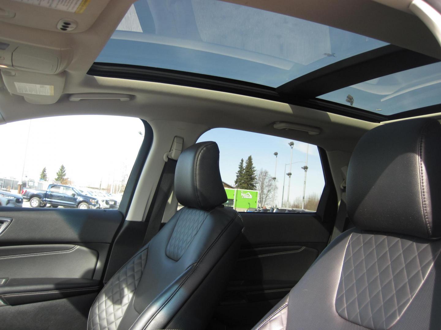 2024 blue /black Ford Edge Titanium (2FMPK4K9XRB) with an 2.0L L4 DOHC 16V engine, 6A transmission, located at 9530 Old Seward Highway, Anchorage, AK, 99515, (907) 349-3343, 61.134140, -149.865570 - Loaded 2024 Ford Edge Titanium, come take a test drive - Photo#11
