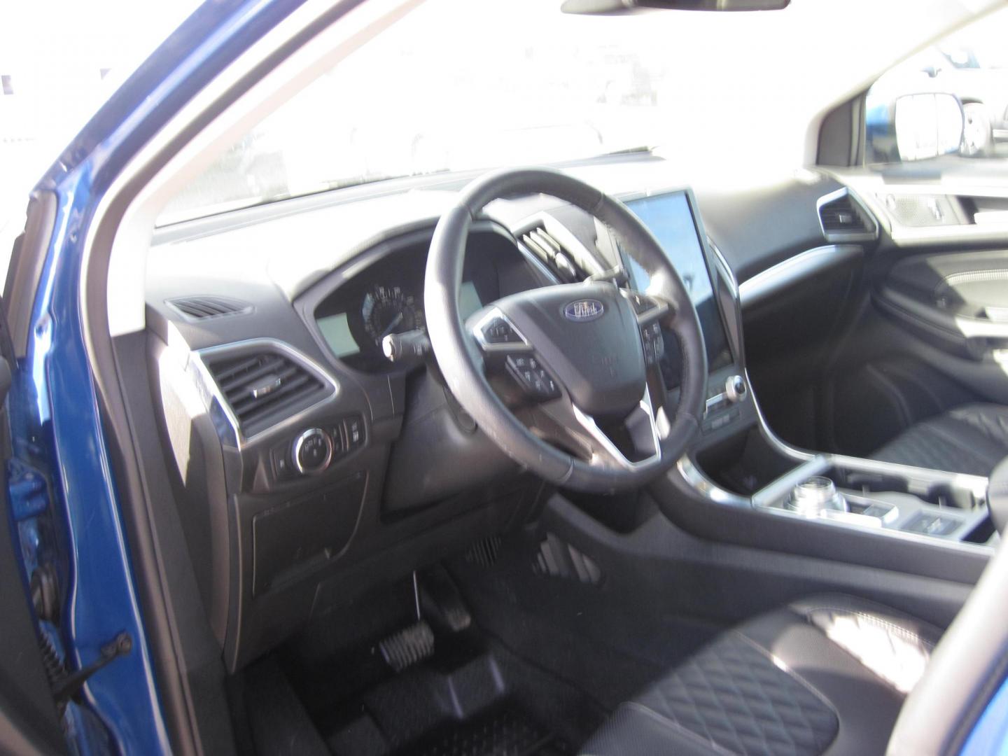 2024 blue /black Ford Edge Titanium (2FMPK4K9XRB) with an 2.0L L4 DOHC 16V engine, 6A transmission, located at 9530 Old Seward Highway, Anchorage, AK, 99515, (907) 349-3343, 61.134140, -149.865570 - Loaded 2024 Ford Edge Titanium, come take a test drive - Photo#9