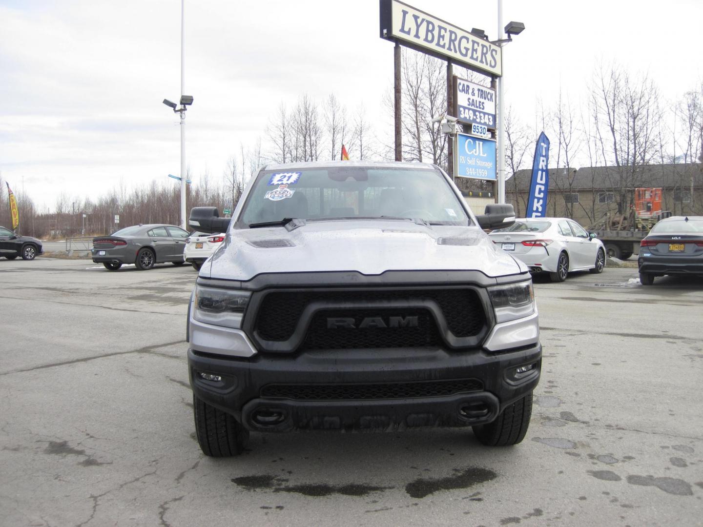 2021 silver /black RAM 1500 Rebel Crew Cab SB 4WD (1C6SRFLT9MN) with an 5.7L V8 OHV 16V engine, 8A transmission, located at 9530 Old Seward Highway, Anchorage, AK, 99515, (907) 349-3343, 61.134140, -149.865570 - Nice Ram 1500 Rebel come take a test drive - Photo#1