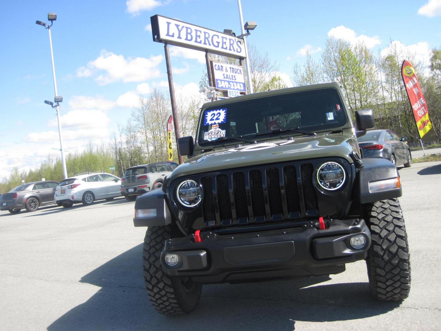 2022 green /black Jeep Wrangler Unlimited Sport (1C4HJXDG8NW) with an 3.6L V6 DOHC 24V FFV engine, 6A transmission, located at 9530 Old Seward Highway, Anchorage, AK, 99515, (907) 349-3343, 61.134140, -149.865570 - Nice Jeep Wrangler Unlimited come take a test drive - Photo#1