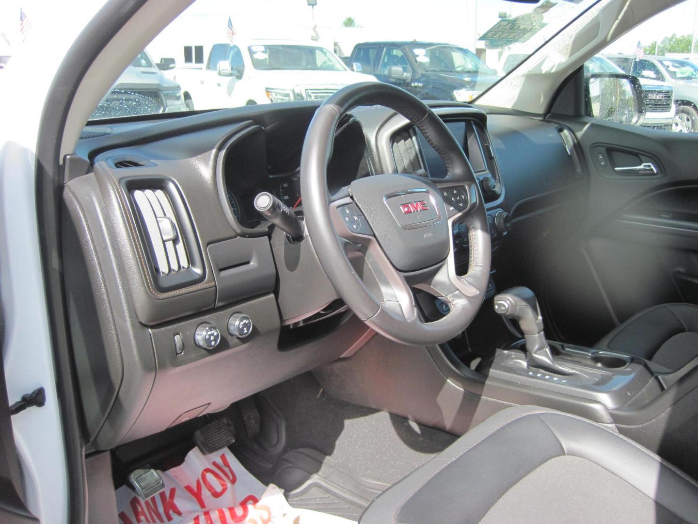 2021 white /black GMC Canyon AT4 Crew Cab w/Cloth 4WD (1GTG6FEN0M1) with an 3.6L V6 DOHC 24V engine, 6A transmission, located at 9530 Old Seward Highway, Anchorage, AK, 99515, (907) 349-3343, 61.134140, -149.865570 - Nice Low Miles on this 2021 GMC Canyon Crew Cab AT4, come take a test drive - Photo#12